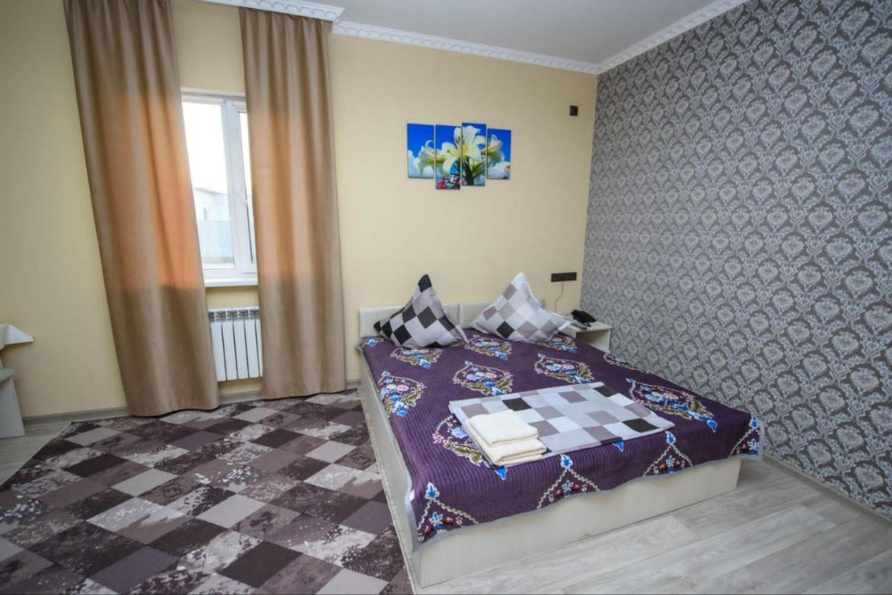 Silk Way Hotel Atiraw Buitenkant foto