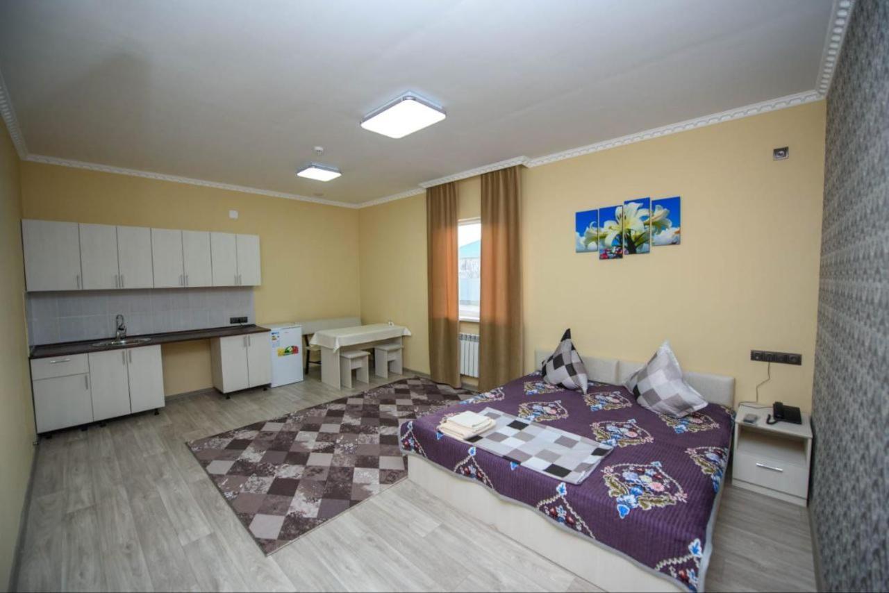 Silk Way Hotel Atiraw Buitenkant foto